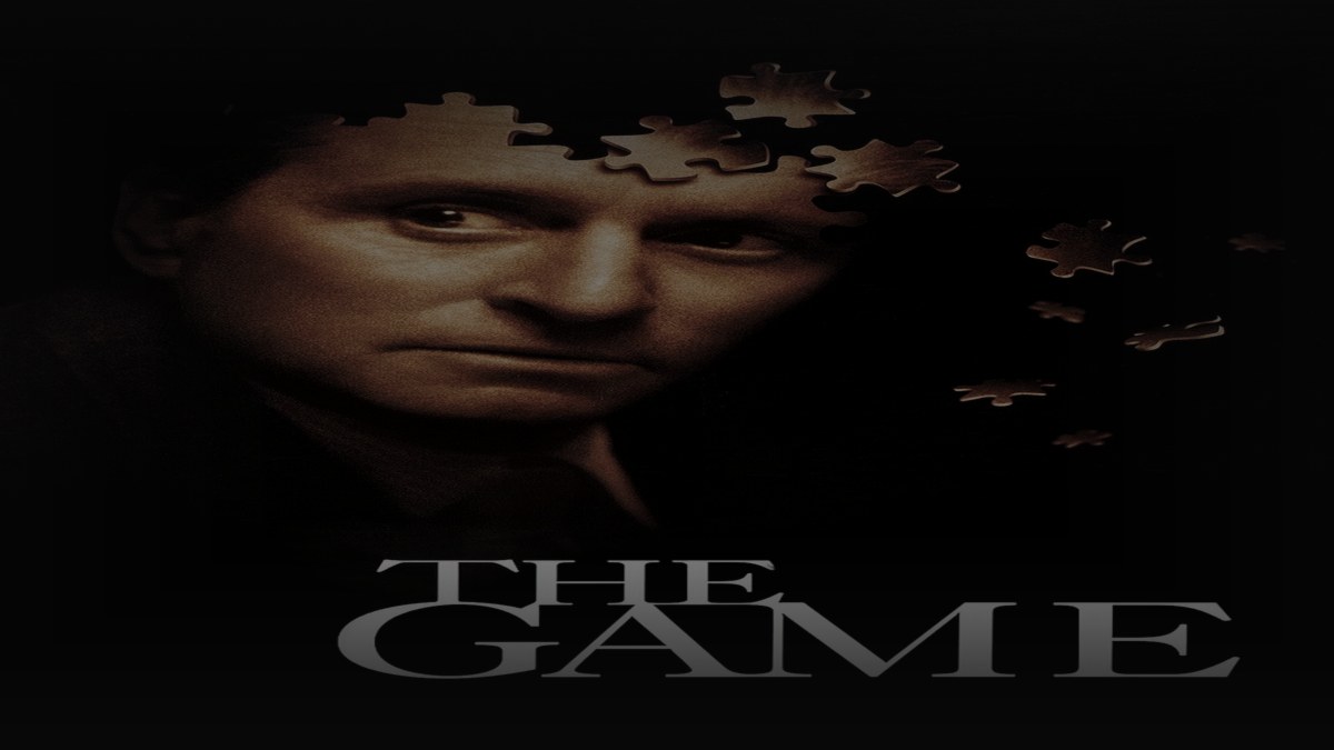 Still from The Game (1997) — tmdb poster (id 2649); genuine film poster. baked at factor 0.45, 1200x675